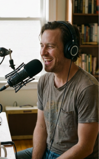 Male podcaster with headphones